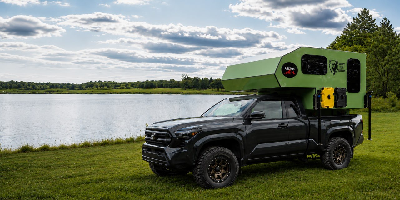 Grumpy Bear Arctos truck camper by the lake
